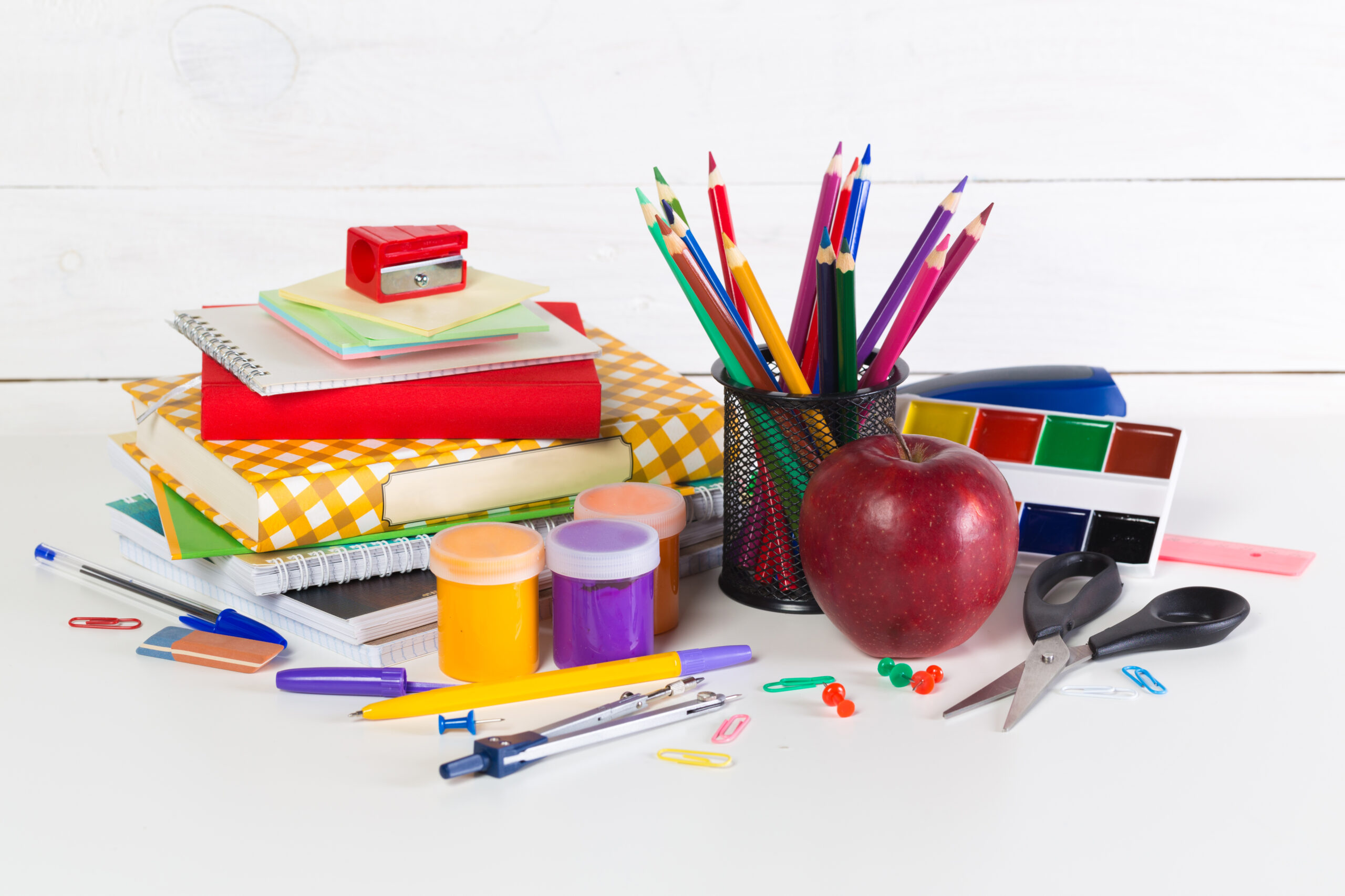 front view school supplies white background scaled